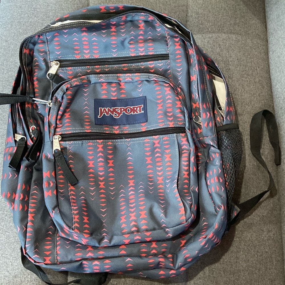 Pink and gray Jansport backpack